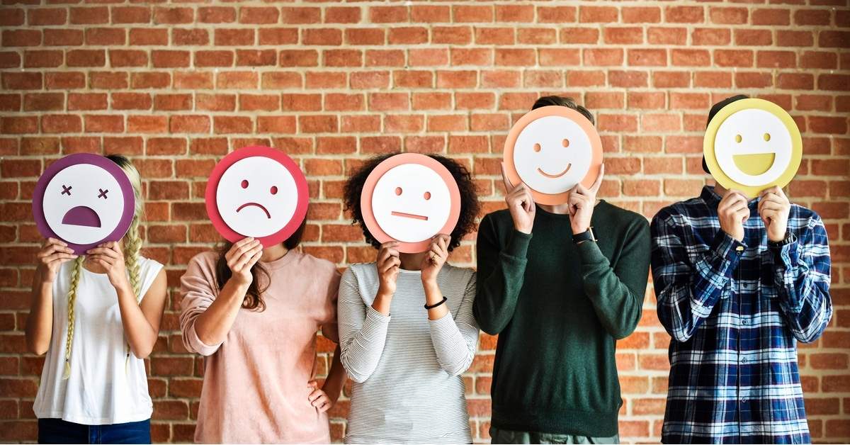 range of emotions depicted with smiley faces