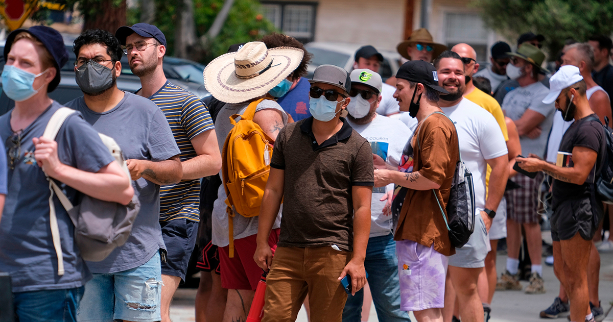 People wait in line to receive the Monkeypox vaccine at Eugene A. Obregon Park in Los Angeles on July 20, 2022.