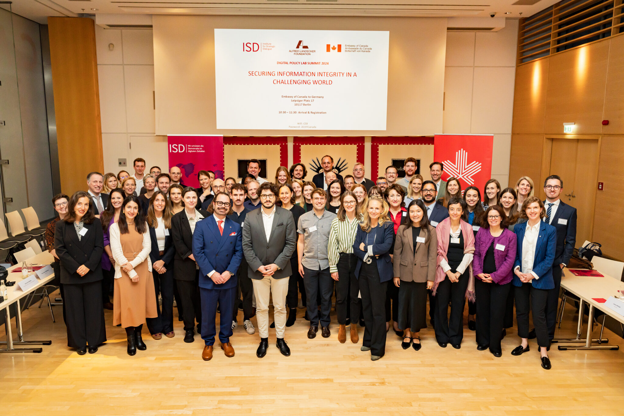 Group photo of the Digital Policy Lab Summit 2024 participants at the Canadian Embassy to Germany in October 2024.