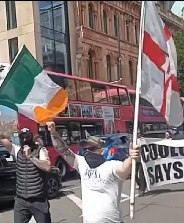 Image 1. Loyalists marching with representatives from Coolock Says No in Belfast, August 2024.